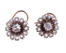A PAIR OF LATE 19TH CENTURY AND LATER DIAMOND FLOWER HEAD CLUSTER EARRINGS