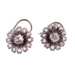 A PAIR OF LATE 19TH CENTURY AND LATER DIAMOND FLOWER HEAD CLUSTER EARRINGS