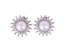 PERCY MARKS, A PAIR OF SOUTH SEA CULTURED PEARL AND DIAMOND CLUSTER EAR CLIPS