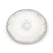 A GEORGE III IRISH SILVER SHAPED CIRCULAR SALVER