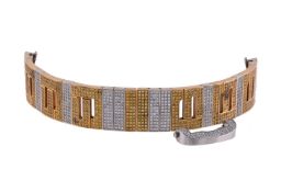 JACOB & CO., A GOLD COLOURED, STEEL, YELLOW SAPPHIRE AND DIAMOND WATCH BRACELET