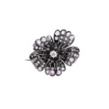 A LATE 19TH/EARLY 20TH CENTURY DIAMOND FLOWER BROOCH