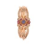 ANSELMO SBIGLIO, A MID 20TH CENTURY SAPPHIRE AND RUBY FLOWER HEAD BRACELET, CIRCA 1950