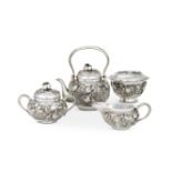 A JAPANESE SILVER THREE PIECE TEA SET