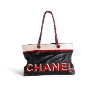 CHANEL, NO. 5 STAR, A BLACK, RED, WHITE AND BLUE LEATHER HANDBAG