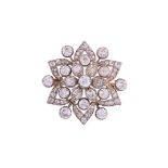 A LATE VICTORIAN AND LATER DIAMOND FLOWER HEAD CLUSTER BROOCH