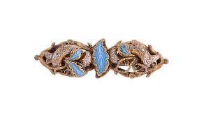 AN ANTIQUE AND LATER GOLD AND ENAMEL BROOCH