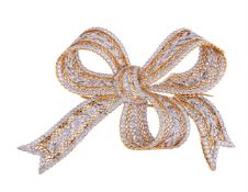 A DIAMOND BOW BROOCH