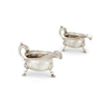 A PAIR OF GEORGE II SILVER SHAPED OVAL SAUCE BOATS