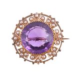 AN EDWARDIAN AMETHYST AND HALF PEARL BROOCH, CIRCA 1910