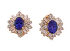 A PAIR OF TANZANITE AND DIAMOND CLUSTER EARRINGS