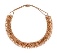 A GOLD COLOURED BEADED COLLAR