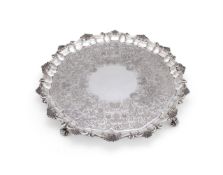 A GEORGE IV SILVER SHAPED CIRCULAR SALVER