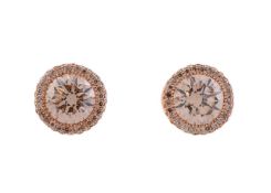 A PAIR OF TINTED DIAMOND CLUSTER EAR STUDS