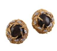 A PAIR OF DIAMOND AND BLACK STAR SAPPHIRE ABSTRACT CLUSTER EARRINGS