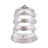 A CASED SET OF FOUR OLD SHEFFIELD PLATED GRADUATED MEAT DISH COVERS