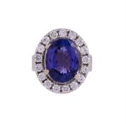 A TANZANITE AND DIAMOND CLUSTER RING