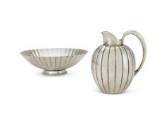 GEORG JENSEN, A DANISH SILVER COLOURED BERNADOTTE STRAWBERRY BOWL AND CREAM JUG