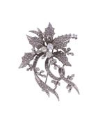 A DIAMOND HOLLY LEAF BROOCH