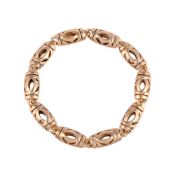 CARTIER, AN 18 CARAT GOLD BRACELET