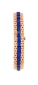 GEORGES L'ENFANT, A MID 20TH CENTURY FRENCH GOLD COLOURED AND LAPIS LAZULI BRACELET