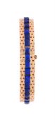 GEORGES L'ENFANT, A MID 20TH CENTURY FRENCH GOLD COLOURED AND LAPIS LAZULI BRACELET