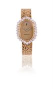 AUDEMARS PIGUET, A LADY'S GOLD COLOURED AND DIAMOND BRACELET WATCH