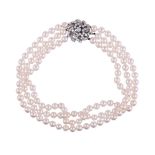 A THREE STRAND CULTURED PEARL NECKLACE WITH FRENCH DIAMOND CLUSTER CLASP