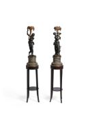 AFTER CLODION- A PAIR OF FRENCH BRONZE AND GREEN GRANITE FIGURAL LIGHTS, LATE 19TH CENTURY