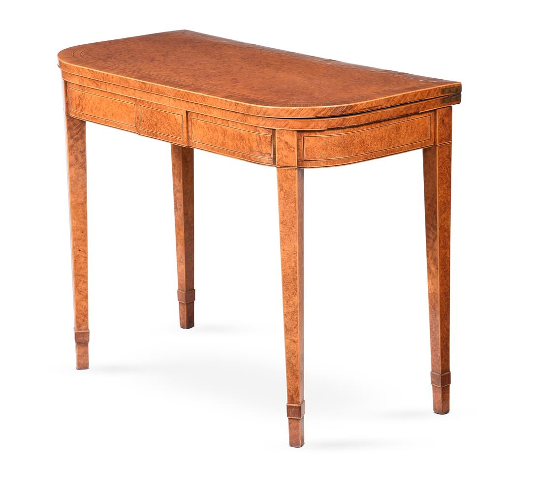 Y AN GEORGE III AMBOYNA AND SATINWOOD FOLDING CARD TABLE, CIRCA 1800