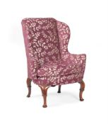 A WALNUT WING ARMCHAIR, EARLY 18TH CENTURY AND LATER