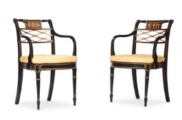 A PAIR OF REGENCY EBONISED, PARCEL GILT AND PAINTED ARMCHAIRS, ATTRIBUTED TO JOHN GEE, CIRCA 1815