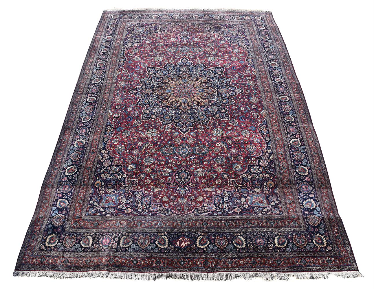 A MESHED CARPET, approximately 535 x 350cm