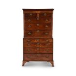 A GEORGE III FIGURED MAHOGANY AND INLAID CHEST ON CHEST, IN THE MANNER OF THOMAS SHERATON