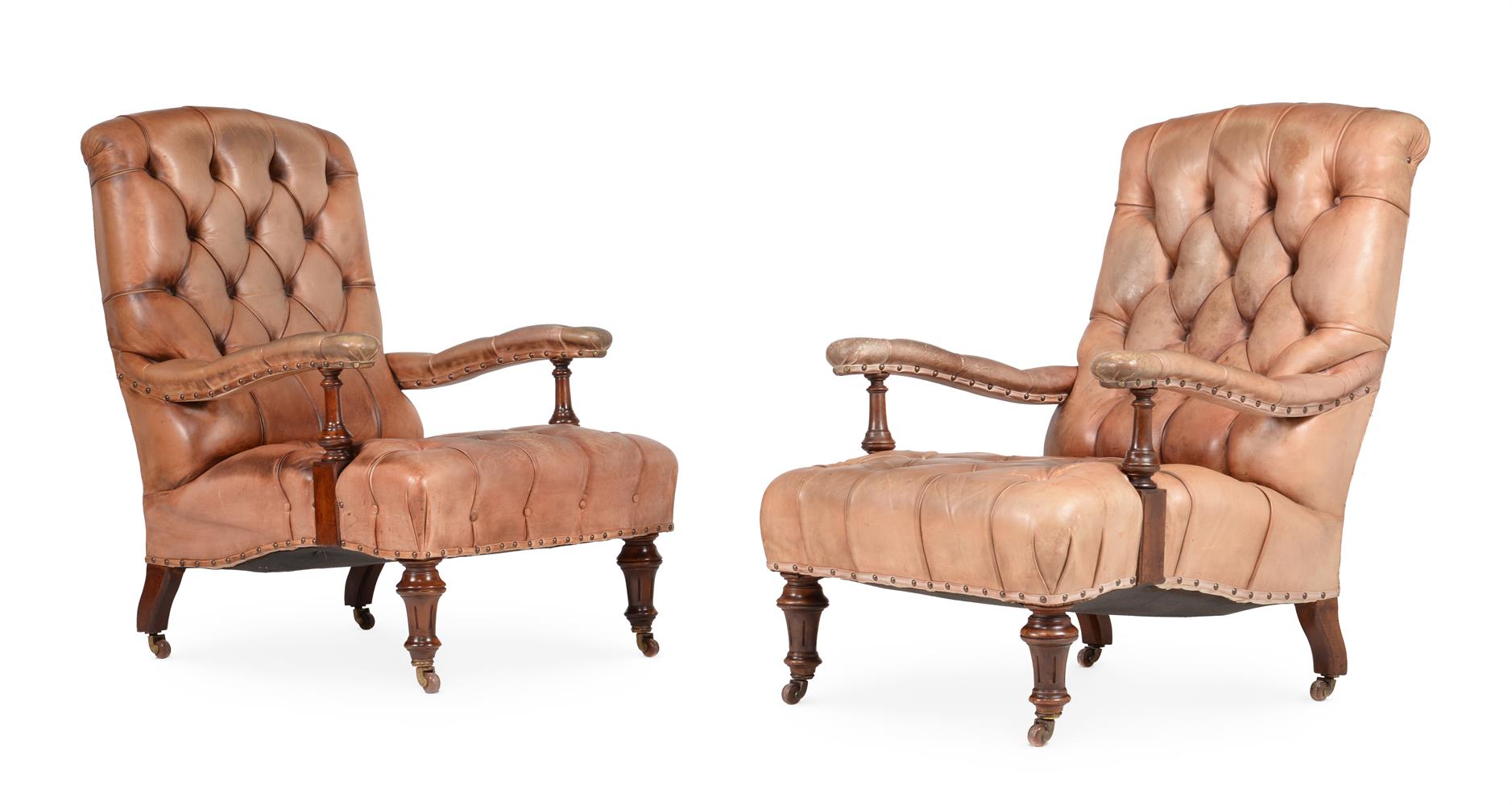 A PAIR OF VICTORIAN WALNUT AND BUTTONED LEATHER UPHOLSTERED ARMCHAIRS, IN THE MANNER OF HOLLAND & SO