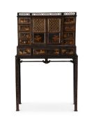 A BLACK AND GILT JAPANNED CABINET OR DESK ON STAND, EARLY 19TH CENTURY
