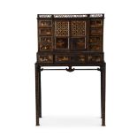 A BLACK AND GILT JAPANNED CABINET OR DESK ON STAND, EARLY 19TH CENTURY