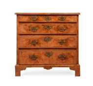 A GEORGE II WALNUT CHEST OF DRAWERS, MID 18TH CENTURY