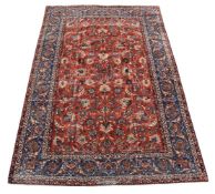 AN ISFAHAN CARPET, approximately 380 x 255cm