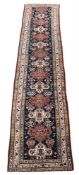 A NORTH WEST PERSIAN RUNNER, approximately 500 x 105cm