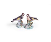 A PAIR OF DERBY PORCELAIN MODELS OF GOLDFINCHES, CIRCA 1760-65