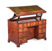 A GEORGE III MAHOGANY DESK, IN THE MANNER OF GILLOWS, CIRCA 1800