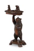 A SWISS 'BLACK FOREST' BEAR TABLE, PROBABLY BRIENZ, FIRST HALF 20TH CENTURY