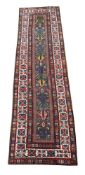 A CAUCASIAN RUNNER, approximately 407 x 104cm