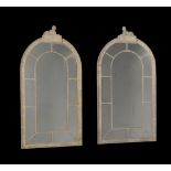 A PAIR OF PAINTED WALL MIRRORSIN THE MANNER OF DESIGNS BY ROBERT ADAM