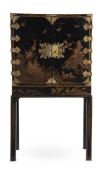 A BLACK LACQUER AND GILT JAPANNED CABINET ON STAND, 18TH CENTURY