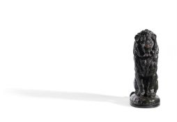 AFTER ANTOINE LOUIS BARYE (FRENCH, 1795-1875), A BRONZE ANIMALIER FIGURE OF A SEATED LION
