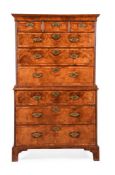 A QUEEN ANNE WALNUT AND FEATHER BANDED CHEST ON CHEST, CIRCA 1710