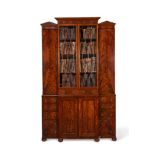 A FIGURED MAHOGANY LIBRARY BOOKCASE, CIRCA 1815 AND LATER