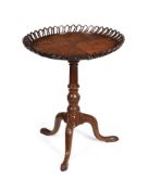 A MAHOGANY TRIPOD TABLE WITH 'BASKET' TOP, IN GEORGE III STYLE, MID 18TH CENTURY AND LATER